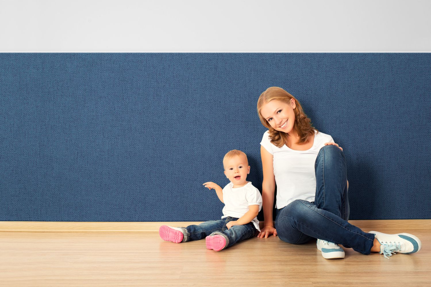 mother and child enjoying their fabricmate fabric panel wainscoting