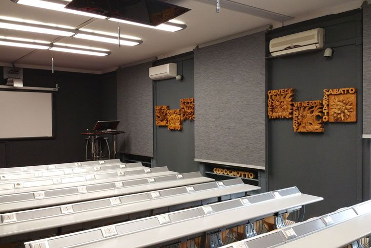 different types of wall coverings - classroom with curtains, paint, and wood panels