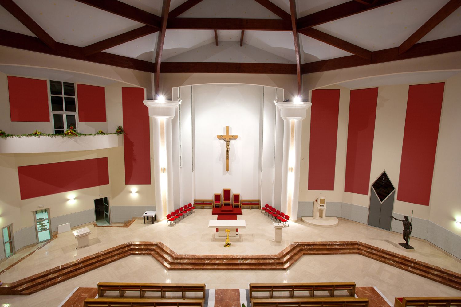 church at night with red acoustic panels