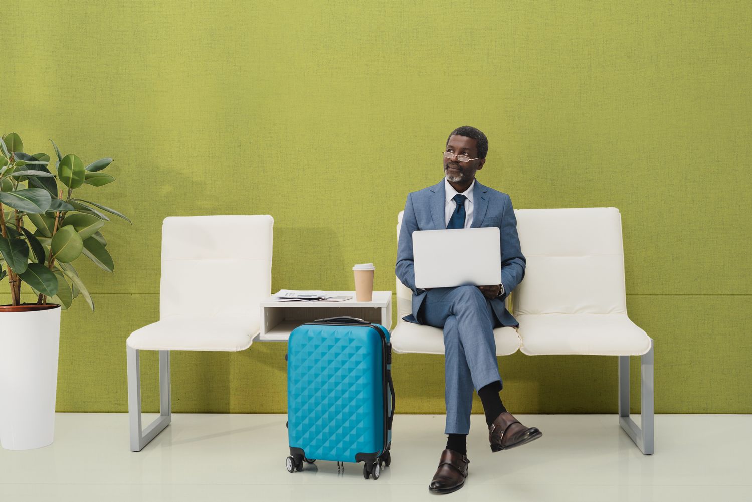 full wall three band panel with tango fabric behind an african american business man